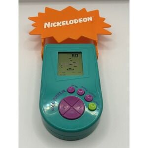 Tested ! Nickelodeon Nick Puzzler Teal Green Handheld Travel Game Electronic LCD